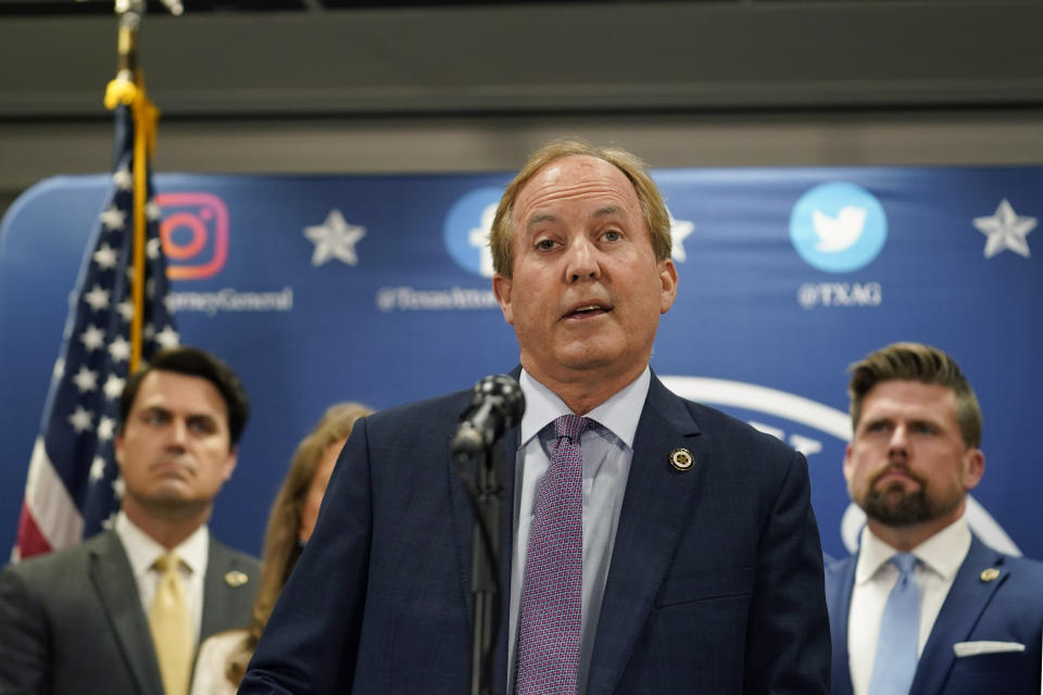 FILE - Texas state Attorney General Ken Paxton reads a statement at his office in Austin, Texas, Friday, May 26, 2023. A historic impeachment trial in Texas to determine whether Republican Paxton should be permanently removed from office will begin no later than August in the state Senate. (AP Photo/Eric Gay, File)