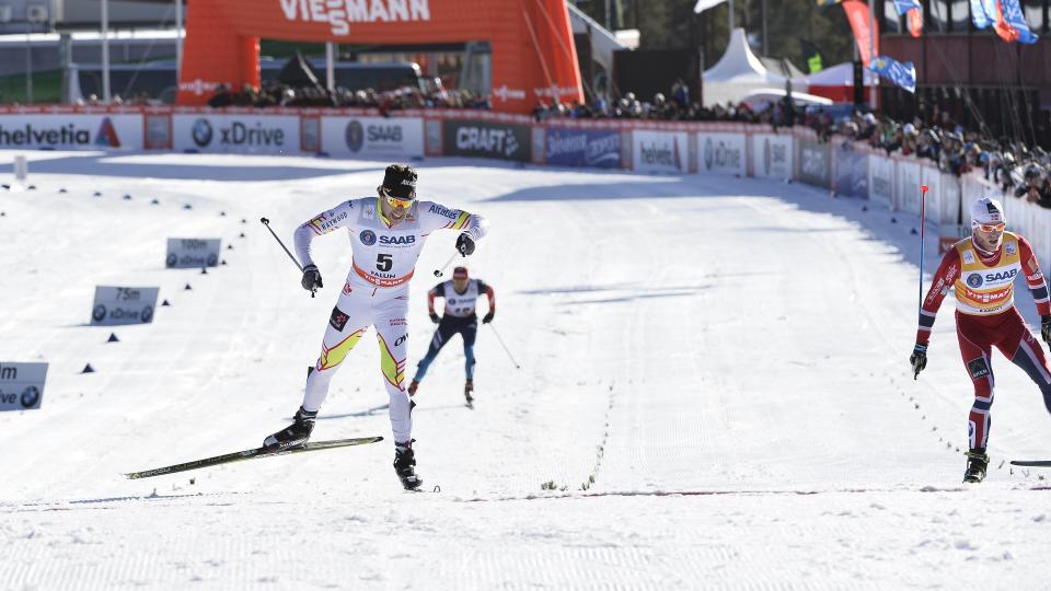 Canada's Alex Harvey, left, jubilates after winning the men's FIS World Cup cross country skiathlon race in Falun, Sweden, Saturday, March 15, 2014. (AP photo/ TT, Anders Wiklund) SWEDEN OUT