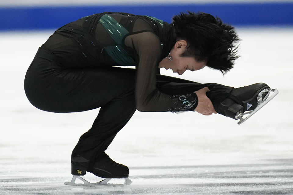 Silver medalist Japan's Shoma Uno performs his Free Skating routine for the Men's Final in the ISU Grand Prix of Figure Skating Final held in Beijing, Saturday, Dec. 9, 2023. (AP Photo/Ng Han Guan)