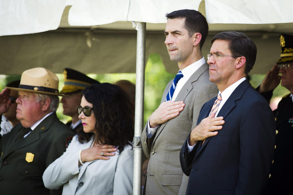 P. Daniel Smith; deputy director, National Park Service, left, Karen Durham-Aquilere; executive director, Army National Military Cemeteries, second from left, and Mark Esper, Secretary of the Army, right, participate in a military funeral with honors for two Civil War Union soldiers at their grave at Arlington National Cemetery in Arlington, Va., Thursday, Sept. 6, 2018. The soldiers were discovered at Manassas National Battlefield and are being buried in Section 81. Arlington National Cemetery opened the new section of gravesites with the burial. (AP Photo/Cliff Owen)