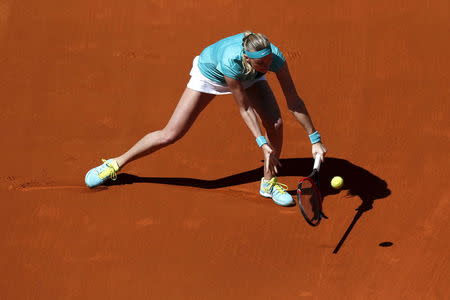 Czech Republic's Petra Kvitova returns the ball to Coco Vandeweghe of the U.S. during their match at the Madrid Open tennis tournament in Madrid, Spain, May 5, 2015. REUTERS/Juan Medina