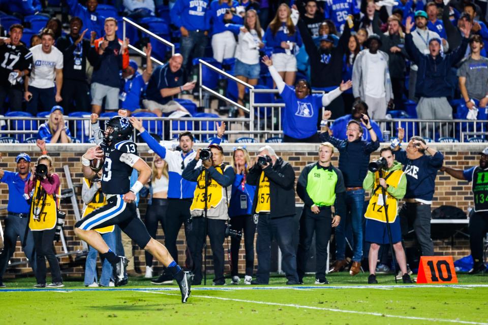 Oct 15, 2022; Durham, North Carolina, USA;  Duke Blue Devils quarterback Riley Leonard (13) runs to make a touchdown during the first half at Wallace Wade Stadium. Mandatory Credit: Jaylynn Nash-USA TODAY Sports