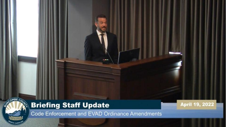 Buncombe County Attorney Brandon Freeman addresses Board of Commissioners April 19 regarding code changes dictated by recently passed state law. Commissioners are set to vote on these changes May 3.