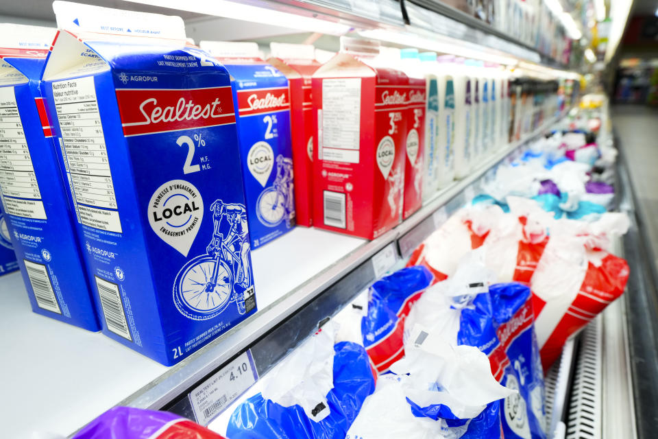 The Dairy Farmers of Canada are recommending that an upcoming adjustment to the farmgate price of milk be delayed amid ongoing food inflation and pressure on the food industry to stabilize prices. Milk and dairy products are displayed for sale at a grocery store in Aylmer, Que., on Thursday, May 26, 2022. THE CANADIAN PRESS/Sean Kilpatrick