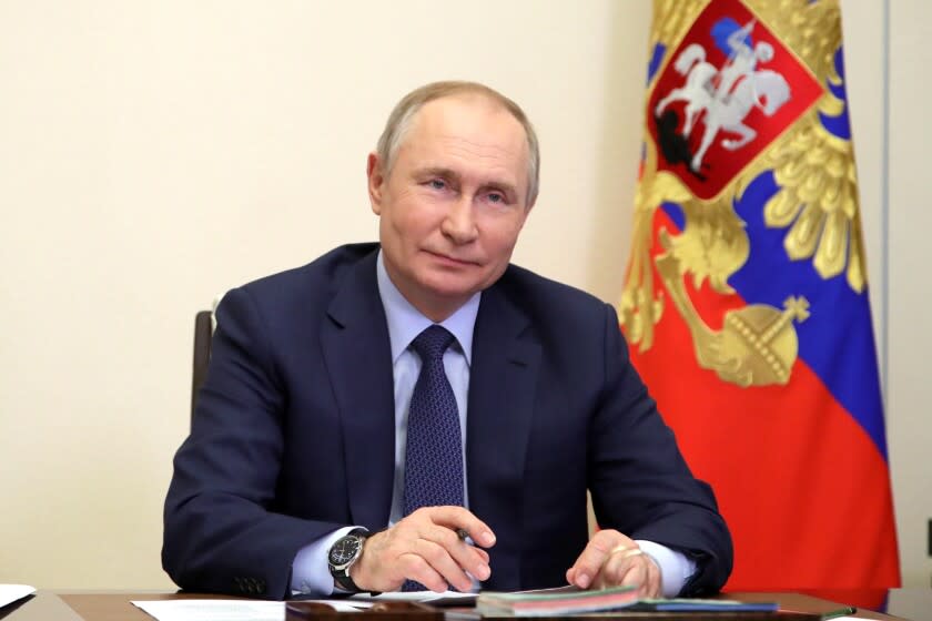 Russian President Vladimir Putin attends a meeting with young award-winning culture professionals via videoconference in Moscow, Russia, Friday, March 25, 2022. (Mikhail Klimentyev, Sputnik, Kremlin Pool Photo via AP)