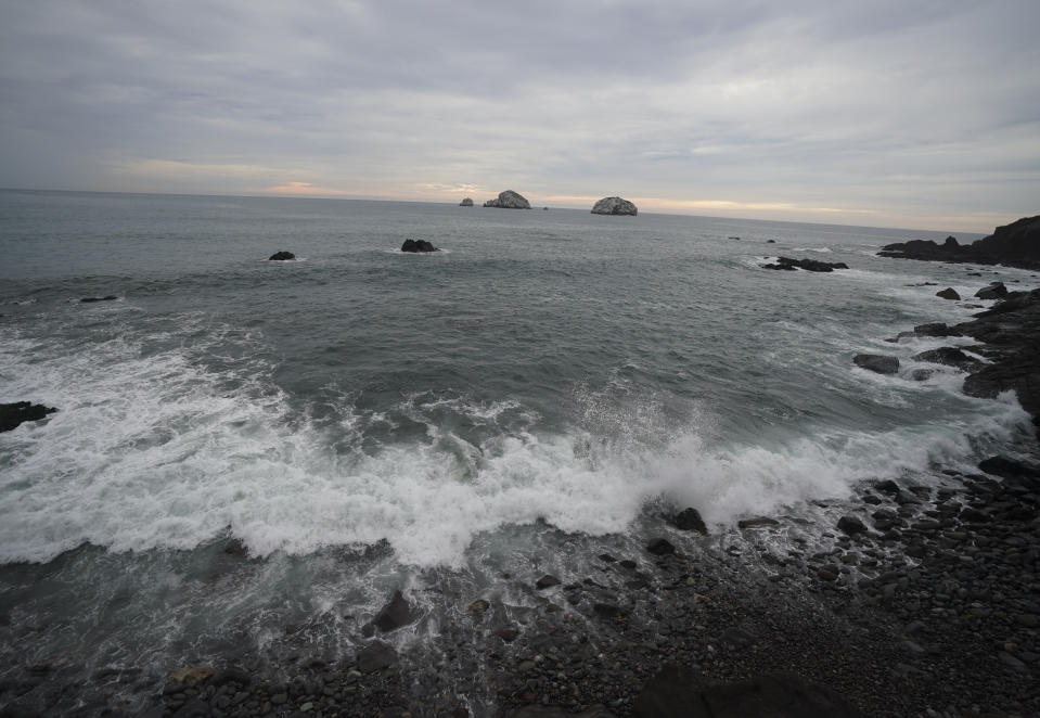 The waves brake on a beach in Mazatlan, Mexico, Sunday, Oct. 2, 2022. Hurricane Orlene, at Category 3 strength, is heading for a collision with Mexico's northwest Pacific coast between the tourist towns of Mazatlan and San Blas. (AP Photo/Fernando Llano)