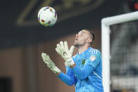 Austin FC goalkeeper Brad Stuver (1) stops a shot during the second half of an MLS soccer match against the Los Angeles FC in Los Angeles, Wednesday, May 18, 2022. (AP Photo/Ashley Landis)