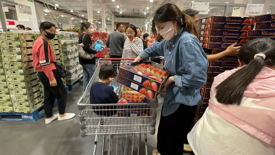 Shoppers snatch up food products at recently opened Costco in Shenzhen. - Justin Robertson/CNN