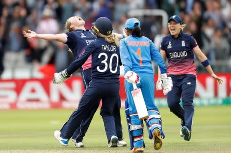 Cricket - Women's Cricket World Cup Final - England vs India - London, Britain - July 23, 2017 England's Anya Shrubsole celebrates with Sarah Taylor after bowling out India's Rajeshwari Gayakwad to win the World Cup Action Images via Reuters/John Sibley