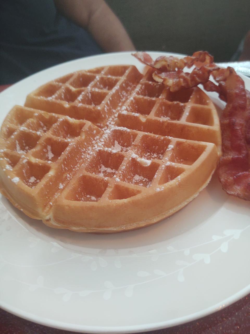 Waterfall Restaurant in Vero Beach serves hot and fluffy Belgian waffles with bacon.