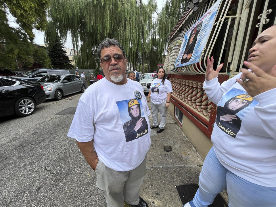 Nelson Garcia, left, the grandfather, and Zoraida Garcia the aunt of Eddie Irizarry speak to reporters, Tuesday, Sept. 26, 2023, in Philadelphia. A judge has dismissed all charges, including a murder count, against Philadelphia Police Officer Mark Dial, who shot and killed, Irizarry, a driver. The judge ruled Tuesday after watching video of the fatal shooting of 27-year-old Irizarry by Officer Dial. (Alejandro A. Alvarez/The Philadelphia Inquirer via AP)