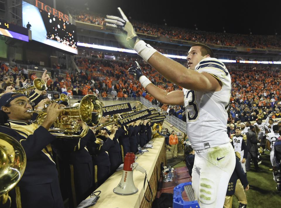 Pittsburgh tight end Scott Orndoff (83) tries to conduct the team band after defeating Clemson 43-42 in an NCAA college football game on Saturday, Nov. 12, 2016, in Clemson, S.C. (AP Photo/Rainier Ehrhardt)