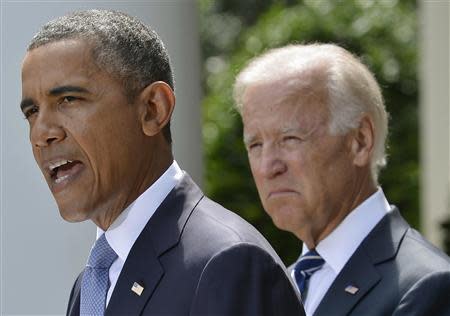 U.S. President Barack Obama speaks about Syria next to Vice President Joe Biden (R) at the Rose Garden of the White House August 31, 2013, in Washington. REUTERS/Mike Theiler