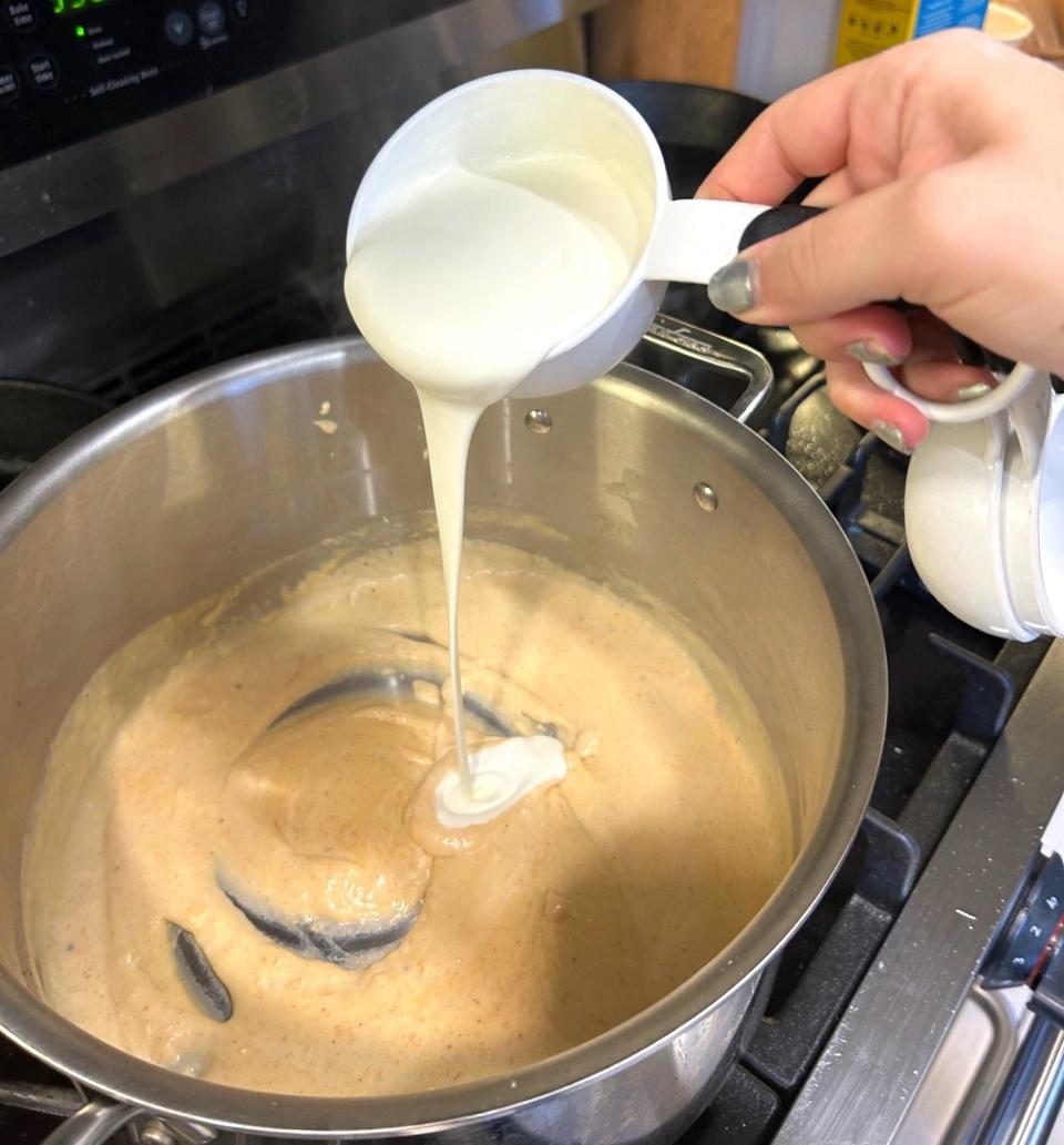 Adding heavy cream to roux for Tini's mac and cheese