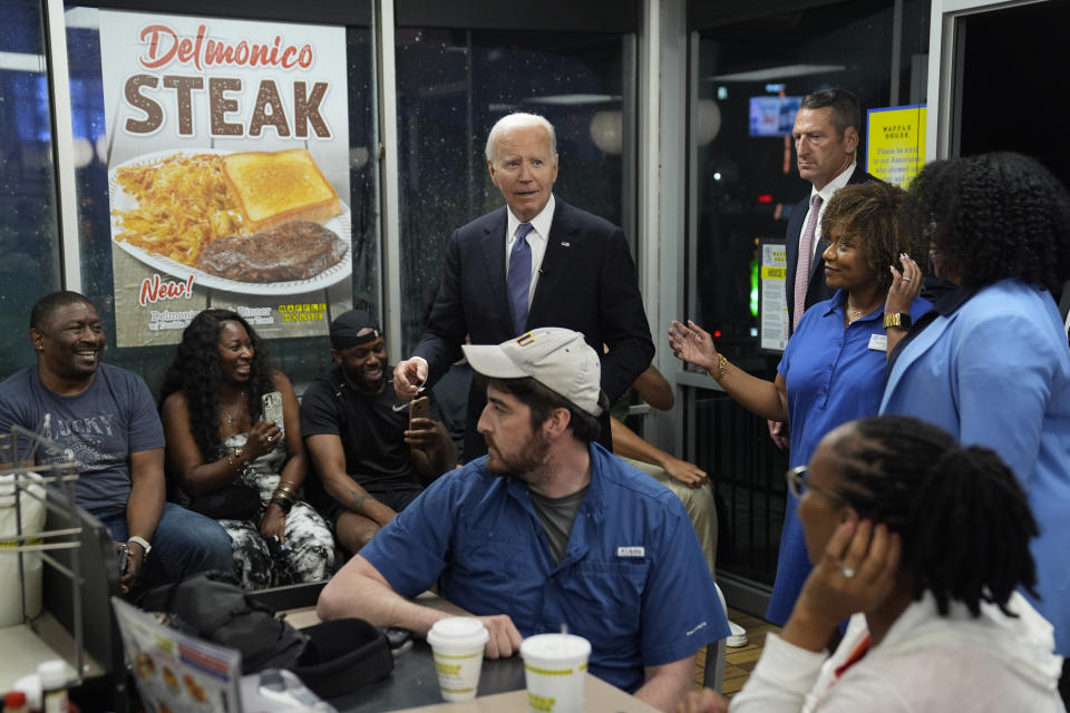 President Joe Biden greets supporters at a Waffle House in Marietta, Ga., Friday, June 28, 2024, following a presidential debate in Atlanta. (AP Photo/Evan Vucci)