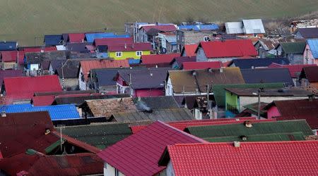 Roofs of refurbished Roma houses are seen in the town of Bystrany, Slovakia, November 28, 2016. REUTERS/David W Cerny