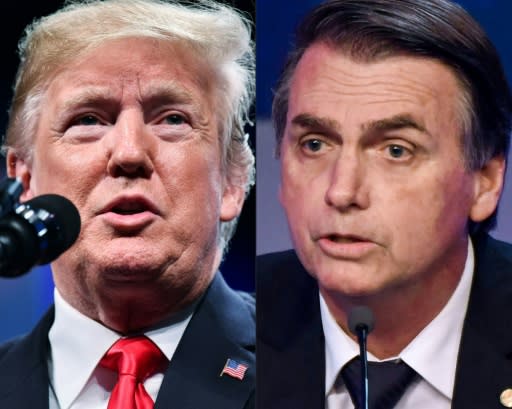 US President Donald Trump (left) stepped up to defend Brazilian counterpart Jair Bolsonaro, tweeting that he was "doing a great job" on the Amazon fires