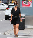 <p>Katie Holmes looks chic in an all-black ensemble as she steps out on Wednesday in N.Y.C. </p>