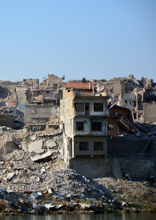 Much of the Old City of Mosul has been reduced to rubble but many residents believe that fugitive jihadists still lurk in hiding more than four months after Iraqi government forces proclaimed its "liberation"