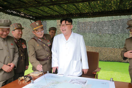 North Korean leader Kim Jong Un provides field guidance during a fire drill of ballistic rockets by Hwasong artillery units of the KPA Strategic Force, in this undated photo released by North Korea's Korean Central News Agency (KCNA) in Pyongyang September 6, 2016. KCNA/Files via Reuters