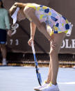 Amanda Anisimova of the U.S. reacts during her first round match against Zarina Diyas of Kazakhstan at the Australian Open tennis championship in Melbourne, Australia, Tuesday, Jan. 21, 2020. (AP Photo/Andy Brownbill)