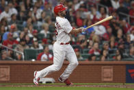 St. Louis Cardinals' Paul Goldschmidt hits a two-run home run during the third inning of a baseball game against the Milwaukee Brewers on Friday, May 27, 2022, in St. Louis. (AP Photo/Michael B. Thomas)