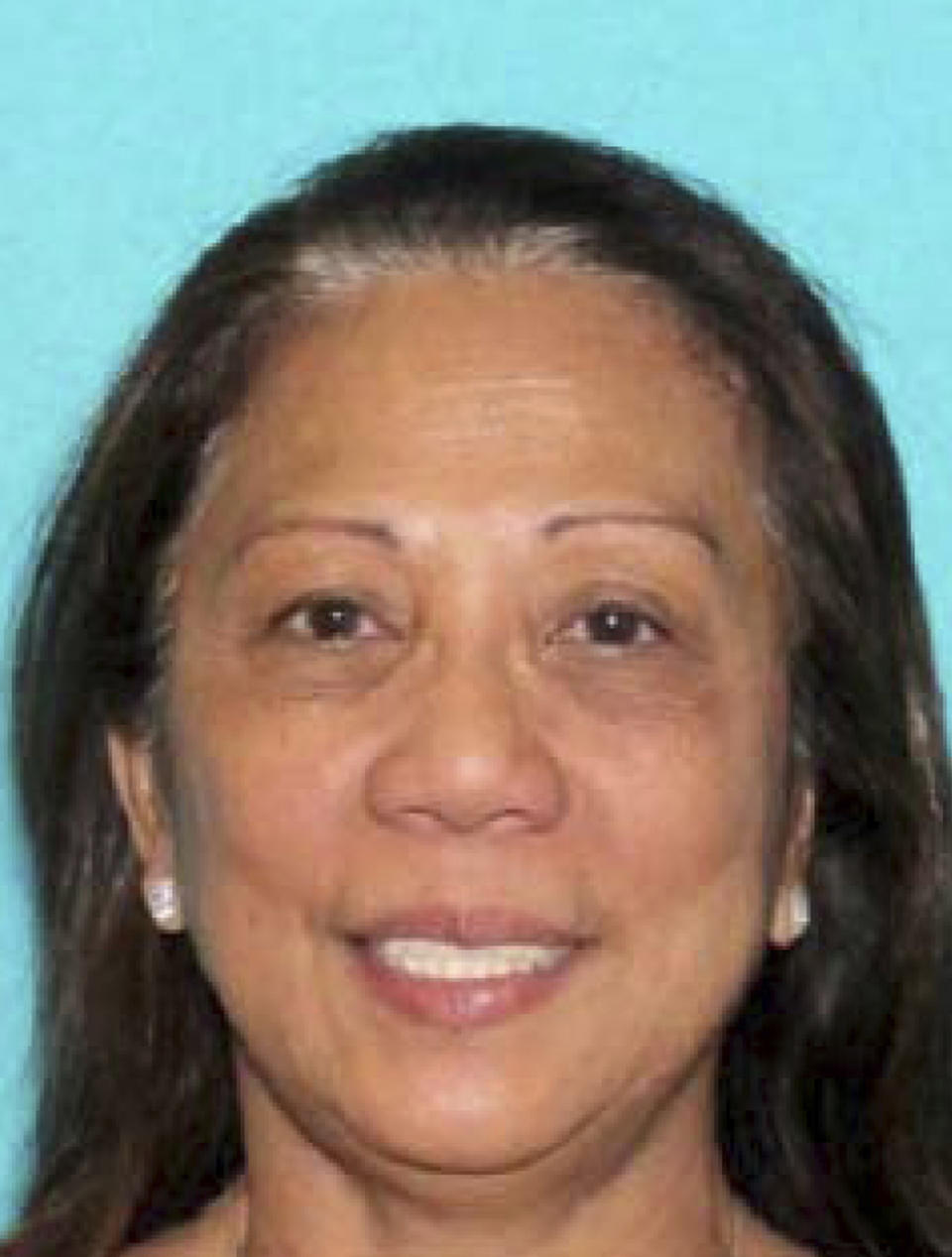 Marilou Danley, 62, returned to the United States from the Philippines on Tuesday night and was met at Los Angeles International Airport by FBI agents, according to a law enforcement official. (Las Vegas Metropolitan Police Department via AP)