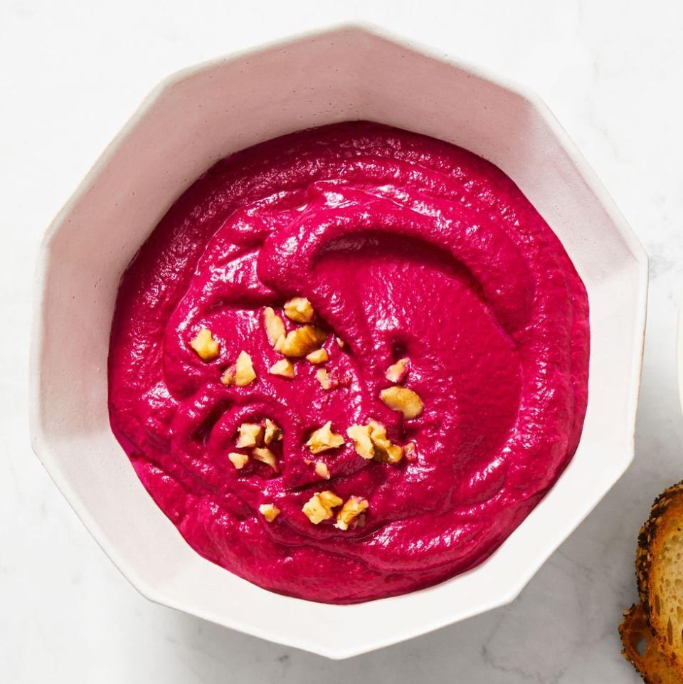 <p>Make this gorgeous, super easy dip in 5 minutes, and keep it refrigerated for up to 5 days. No time to cook your own beets? Buy pre-cooked.</p><p>Get the<strong> <a href="https://www.goodhousekeeping.com/food-recipes/a28498077/zesty-beet-dip-recipe/" rel="nofollow noopener" target="_blank" data-ylk="slk:Zesty Beet Dip recipe;elm:context_link;itc:0;sec:content-canvas" class="link ">Zesty Beet Dip recipe</a></strong><em>.</em></p>