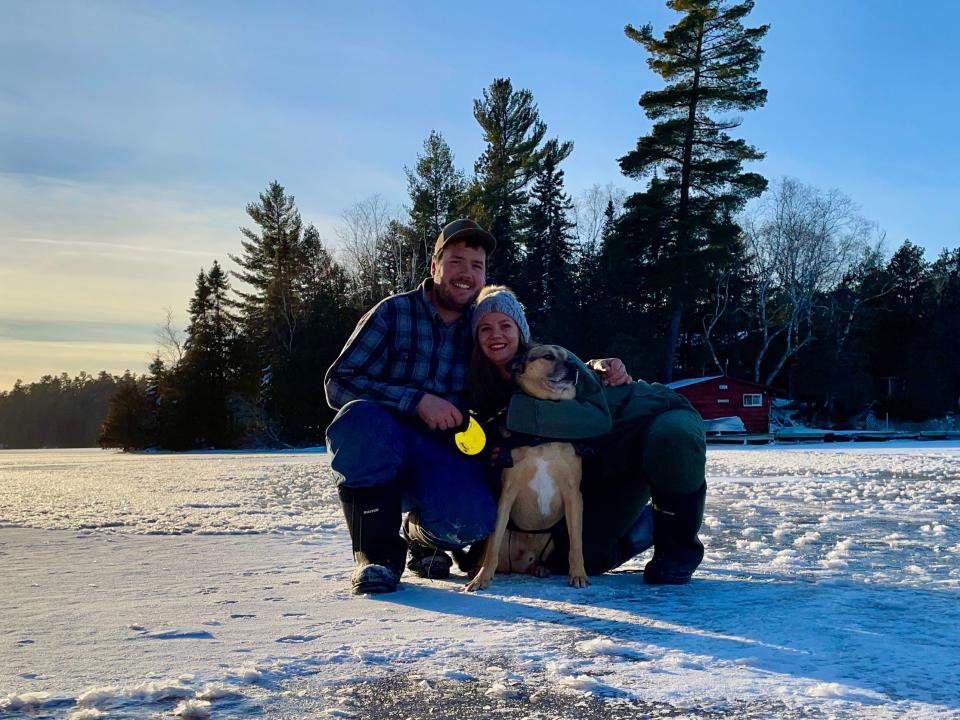 Dominique, her husband and dog.