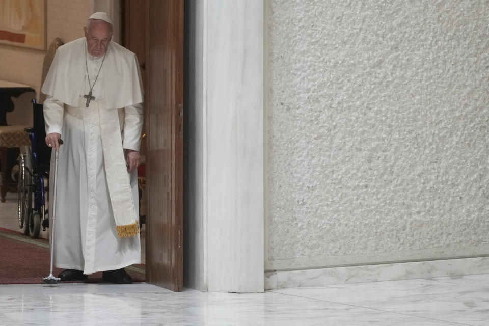 Pope Francis arrives in the Paul VI hall on the occasion of the weekly general audience at the Vatican, Wednesday, Aug. 3, 2022. (AP Photo/Gregorio Borgia)