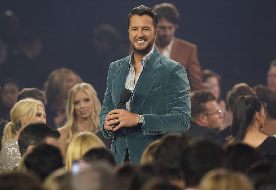 Host Luke Bryan appears in the audience at the 55th annual CMA Awards on Wednesday, Nov. 10, 2021, at the Bridgestone Arena in Nashville, Tenn. (AP Photo/Mark Humphrey)