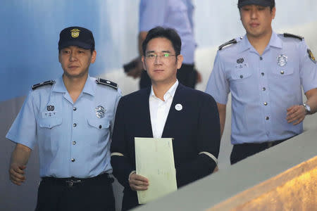 Lee Jae-yong, Samsung Group heir arrives at Seoul Central District Court to hear the bribery scandal verdict on August 25, 2017 in Seoul, South Korea. REUTERS/Chung Sung-Jun/Pool