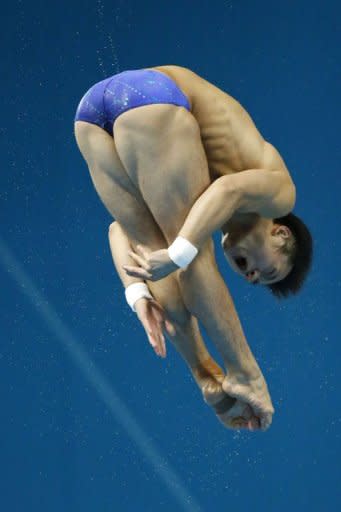 China's Qiu Bo competes during the men's 10m platform final during at the London 2012 Olympic Games. Qui won silver