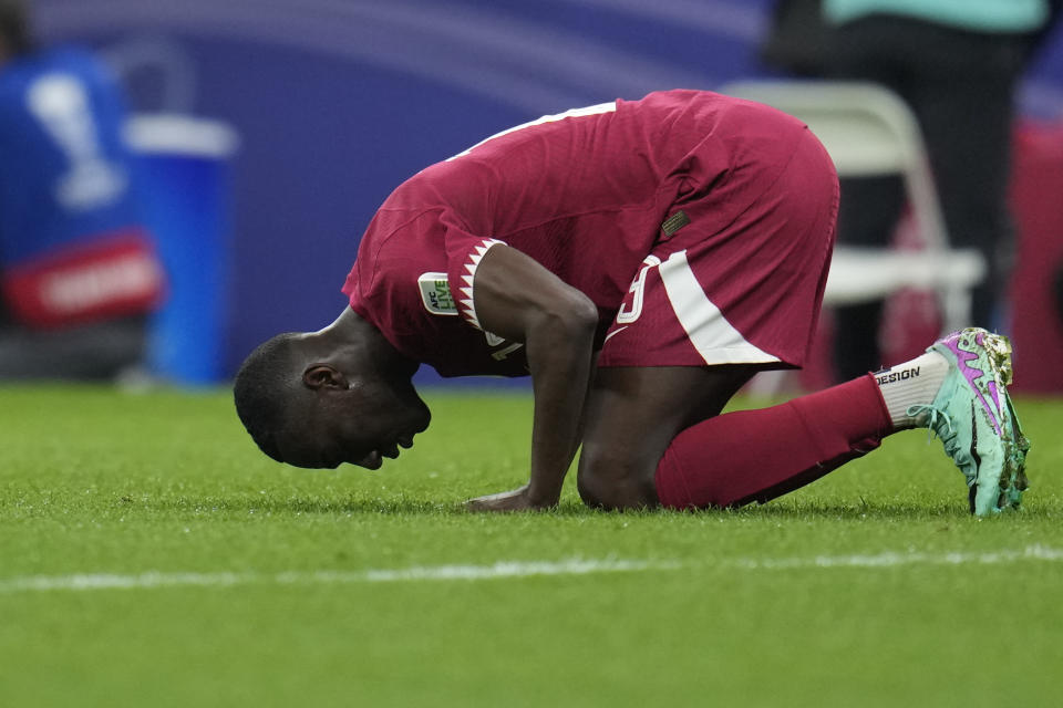 Qatar's Almoez Ali celebrates after scoring his side's second goal during the Asian Cup Group A soccer match between Qatar and Lebanon at the Lusail Stadium in Lusail, Qatar, Friday, Jan. 12, 2024. (AP Photo/Aijaz Rahi)