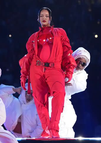 <p>Kevin Mazur/Getty</p> Rihanna performs during the Super Bowl LVII Halftime Show