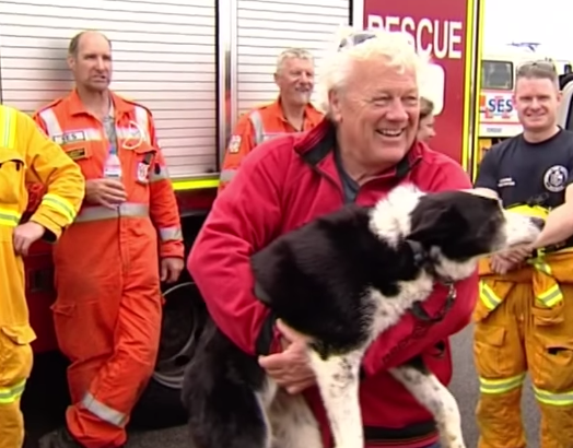 Jimmy reunited with his owner after the harrowing rescue. Source: 9News