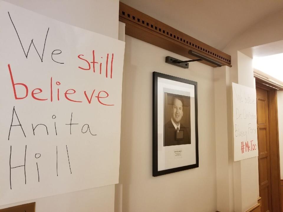 Another sign on Yale's campus, next to a photo of Kavanaugh. (Photo: Courtesy Yale Law School students organizing protests)