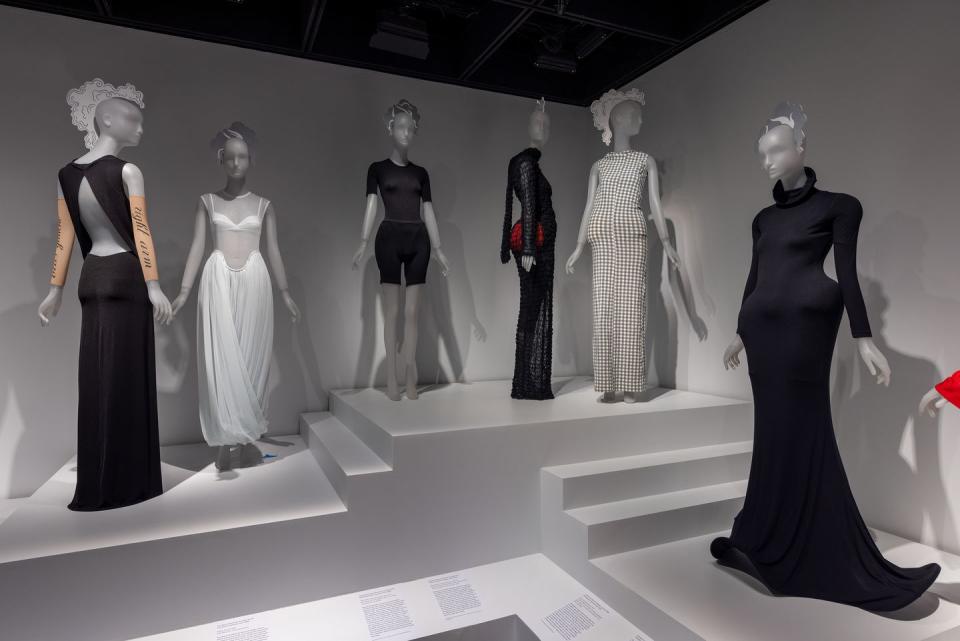 a group of mannequins in a room