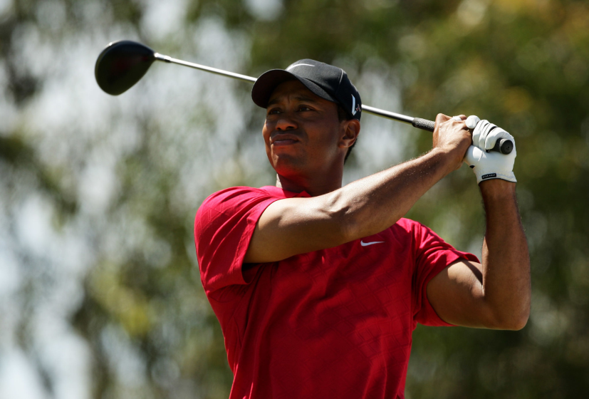 MELBOURNE, AUSTRALIA - NOVEMBER 15: Tiger Woods of the USA tees off on the 12th hole.