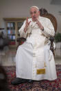 Pope Francis speaks during an interview with The Associated Press at the Vatican, Tuesday, Jan. 24, 2023. Francis acknowledged that Catholic bishops in some parts of the world support laws that criminalize homosexuality or discriminate against the LGBTQ community, and he himself referred to homosexuality in terms of "sin." But he attributed attitudes to culture backgrounds, and said bishops in particular need to undergo a process of change to recognize the dignity of everyone. (AP Photo/Domenico Stinellis)