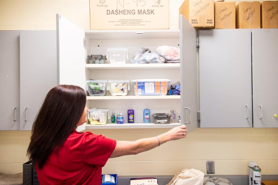 Montgomery EMA Director Christina Thornton shows a hygiene collection inside the Montgomery Crisis Center in Montgomery, Ala., on Thursday, Nov. 3, 2022.