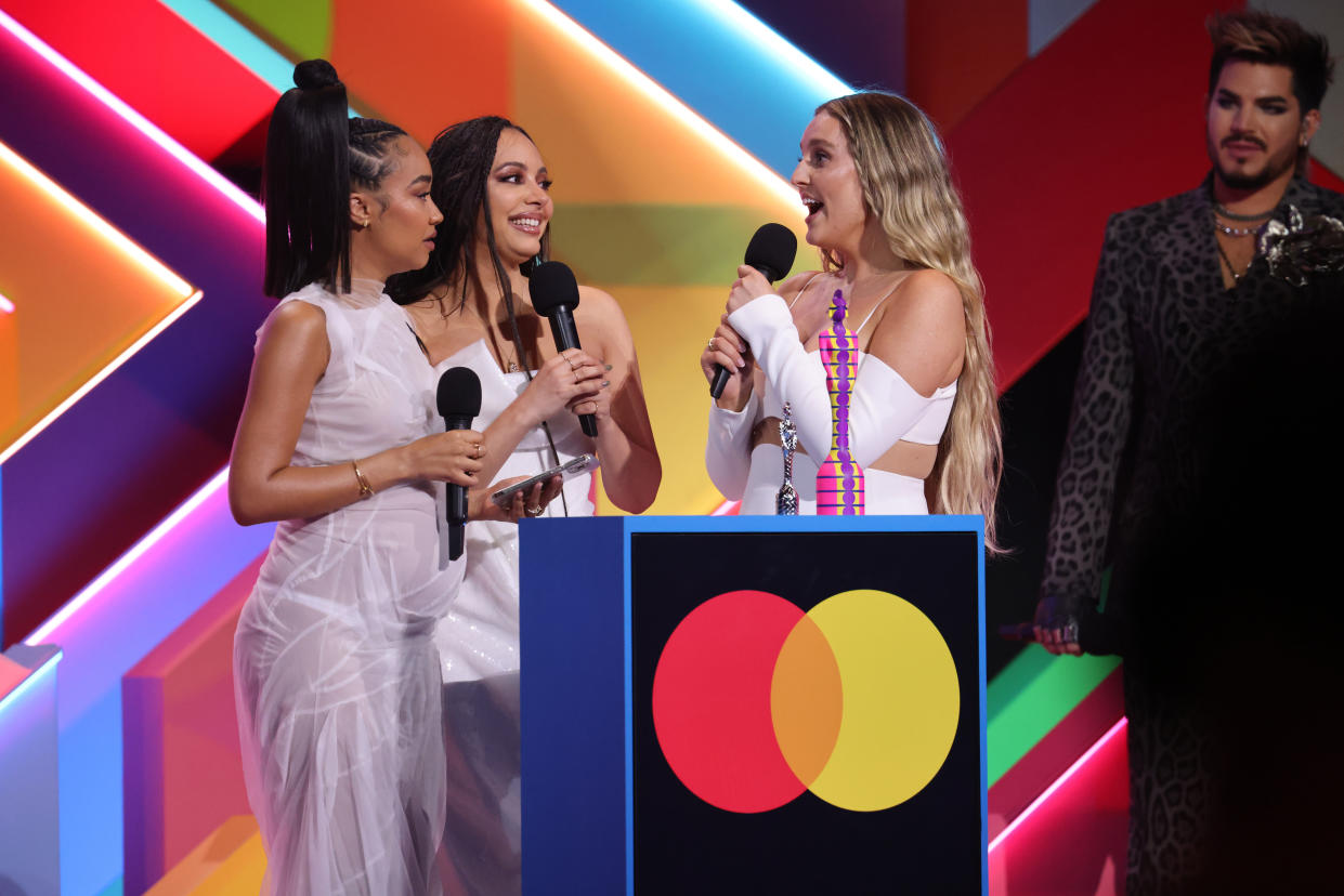 LONDON, ENGLAND - MAY 11: Leigh-Anne Pinnock, Jade Thirlwall and Perrie Edwards of Little Mix on stage after winning the British Group award during The BRIT Awards 2021 at The O2 Arena on May 11, 2021 in London, England. (Photo by JMEnternational/JMEnternational for BRIT Awards/Getty Images)