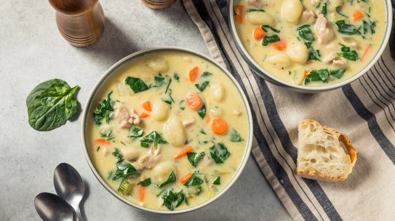 Creamy chicken soup in bowls