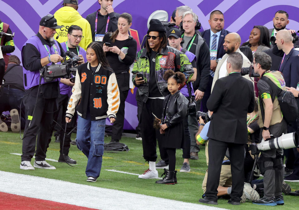 LAS VEGAS, NEVADA - FEBRUARY 11: (L-R) Blue Ivy Carter, Jay-Z and Rumi Carter are seen prior to Super Bowl LVIII at Allegiant Stadium on February 11, 2024 in Las Vegas, Nevada. (Photo by Ethan Miller/Getty Images)