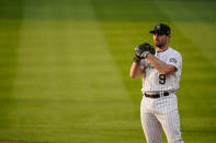 Colorado Rockies first baseman Daniel Murphy waits a San Francisco Giants batter during the third inning of a baseball game Tuesday, Aug. 4, 2020, in Denver. (AP Photo/Jack Dempsey)