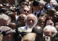 Barry Steenkamp, father of Reeva Steenkamp, leaves the court after the sentencing of South African Olympic and Paralympic sprinter Oscar Pistorius in Pretoria October 21, 2014. REUTERS/Mike Hutchings