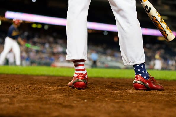 Rep. Fred Upton (R-MI) wears patriotic socks as he waits to bat during the Congressional Baseball Game on June 14, 2018 in Washington, DC. This was the 57th annual game between the Republicans and Democrats. (Photo by Alex Edelman/Getty Images)