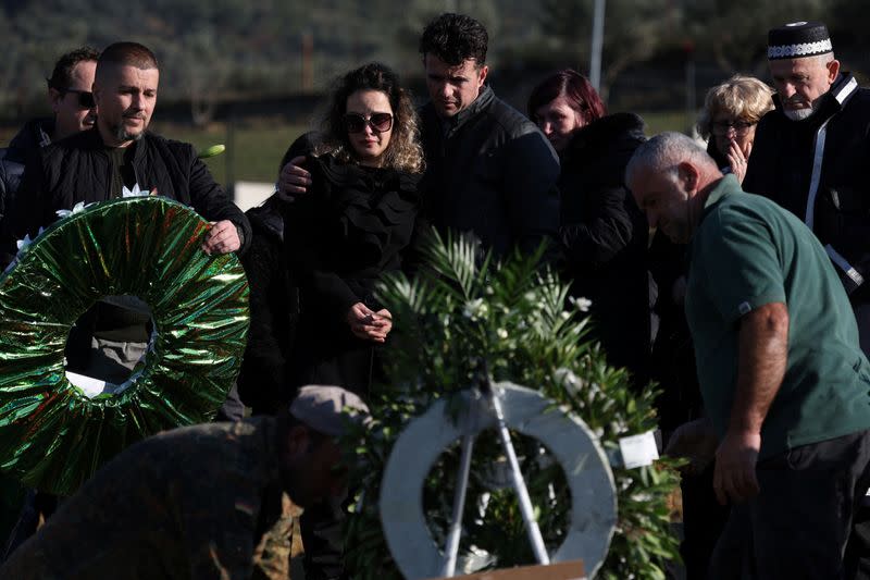 Family and friends take part in the funeral of Leonard Farruku, who died in December on the Bibby Stockholm accommodation barge in the United Kingdom