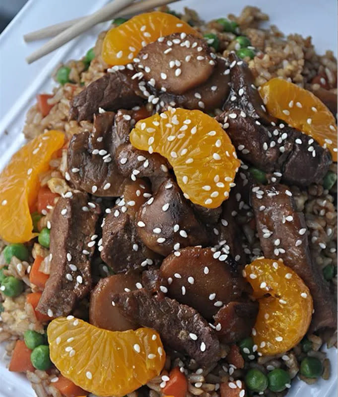 <p>Enjoy summer’s citrus vibes with a perfect slow-cooker ginger orange beef.</p><p><strong>Get the recipe: <a href="https://parade.com/842358/kristamarshall/slow-cooker-ginger-orange-beef/" rel="nofollow noopener" target="_blank" data-ylk="slk:Slow-Cooker Ginger Orange Beef;elm:context_link;itc:0;sec:content-canvas" class="link ">Slow-Cooker Ginger Orange Beef</a></strong></p>