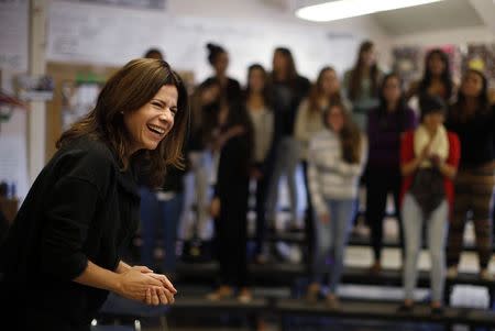 Opera singer Ana Maria Martinez laughs during a visit with students at Lake View High School in Chicago, Illinois, October 22, 2014. REUTERS/Jim Young